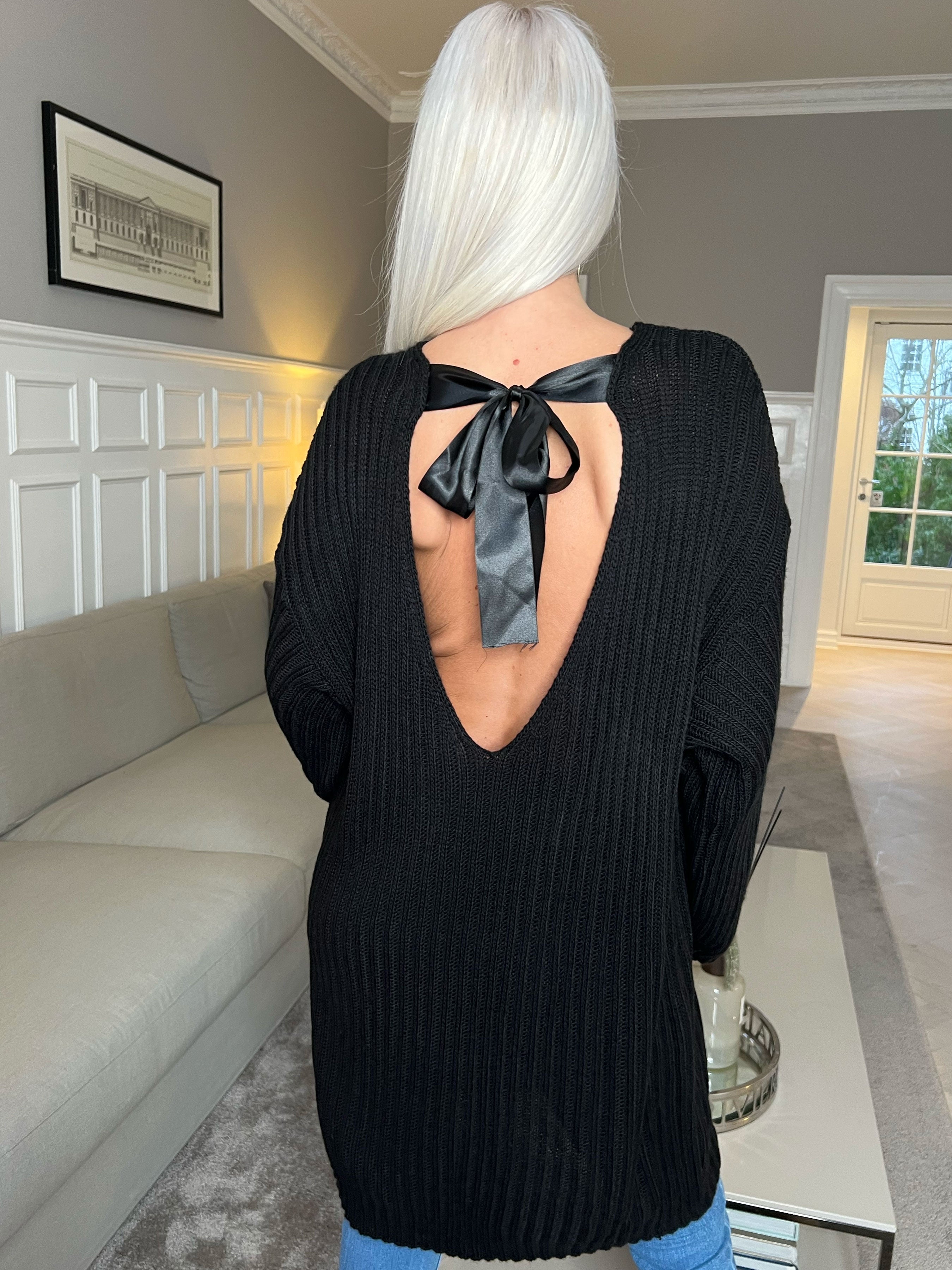 Dica - Stickad klänning med rosett i ryggen